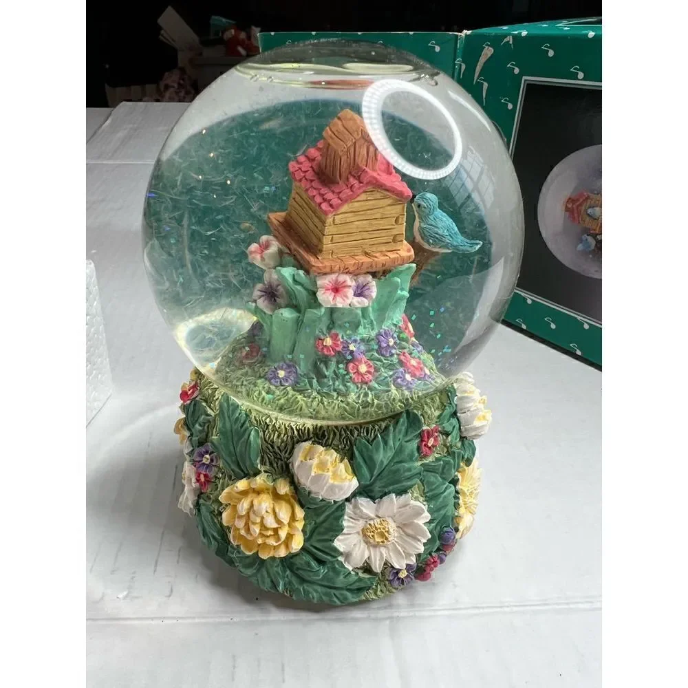 Vintage birdhouse musical water globe